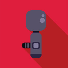 Action camera capturing extreme sports moments with long shadow on red background