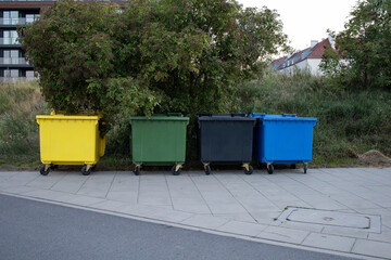 Big garbage sorting cans on the street