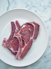 Raw beef steak ready for cooking on the BBQ