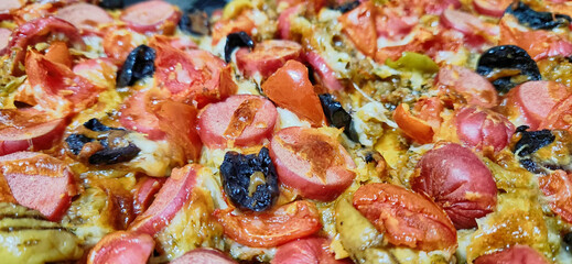 mixed pizza background with lots of ingredients