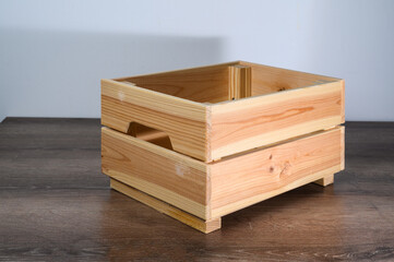Wooden box on a wooden table with isolated background