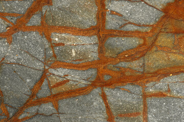 Natural rock texture of a colorful rock formations in silence beach (playa del Silencio) in...