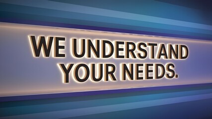 A sign with the words "We understand your needs" written in bold, minimalist letters.