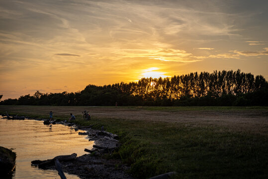 sunrise over the river and trees