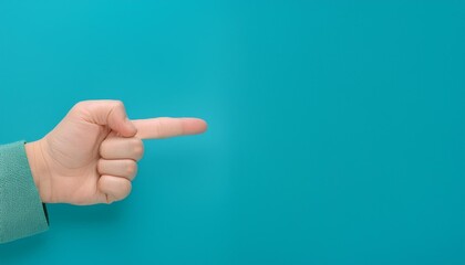 Lecturer's finger pointing to blackboard for explanation