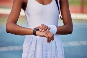 Woman, tennis and smart watch for outdoor training with check heart rate, health info and body stats. Sports athlete, wearable tech and monitor performance for workout, progress and app data on court