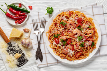 shrimp fra diavolo with spaghetti on a plate