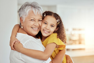 Hugging, sofa and portrait of child with grandmother for love, care and bonding together in home....