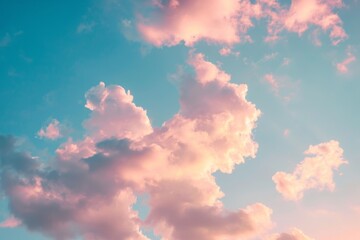A photo featuring a sky with vibrant shades of pink and blue, adorned with gently drifting clouds, Pink clouds scattered across a bright blue sky during sunset, AI Generated