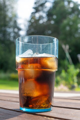 glass of cola with ice