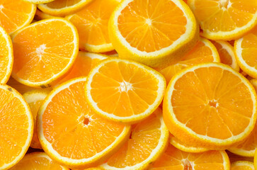Slices of citrus fruit on cutting board