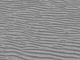 Sand structures in the mudflats in the North Sea, minimal black and white photo