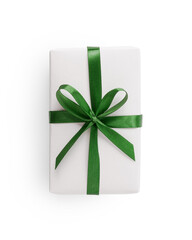 Top view of white gift box with green ribbon isolated on white background