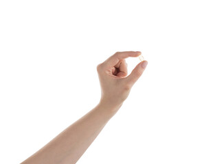 Female hand hold transparent pill isolated on white