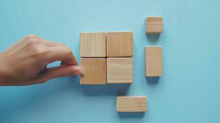 hand holding wooden blocks