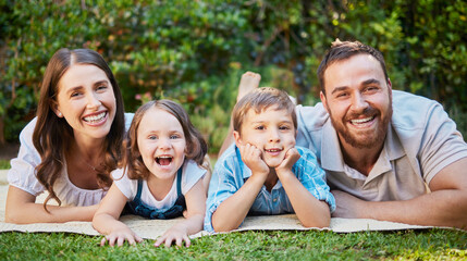 Fototapeta premium Laughing, family and portrait in garden for relax, morning and together or outdoor for holiday. Mom, dad or children in backyard or countryside for mothers day in nature or happy for love and support