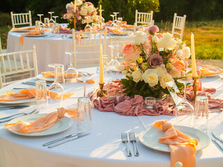 Luxury elegant wedding reception table arrangement and floral centerpiece - wedding banquet and event outdoor