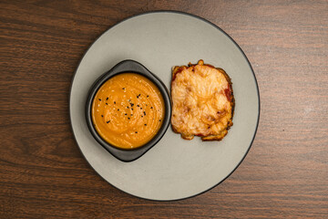 Toast with melted cheese and soup