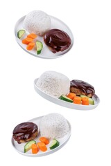 Asian meet hamburger with sauce, rice and vegetables in a plate on a white isolated background