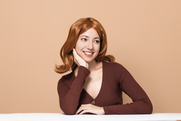 Beautiful woman with soft and healthy skin, silky hair, elegant look on minimalistic background....