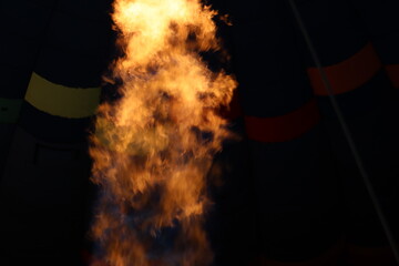Propane gas flame filling a hot air balloon with warm air 