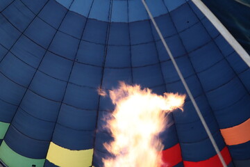 Propane gas flame filling a hot air balloon with warm air 
