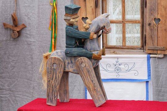 An old Polish folk wooden toy depicting an uhlan on a horse.
