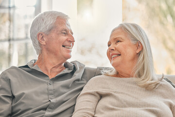 Senior couple, home and happy in living room on sofa for bonding, love and support. People, relationship and smile as pensioner for retirement on couch to relax, break and respect for care as lovers