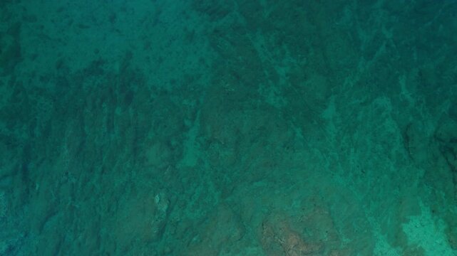 Bird's Eye Descend into Crystal Clear Water in the Adriatic Sea, Krk, Croatia 