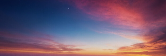 Fototapeta premium Wunderschöner Sonnenaufgang mit sanften Farben und leuchtenden Wolken, die den Himmel in einem pastellfarbenen Spektakel erstrahlen lassen und eine friedliche Morgenstimmung erzeugen
