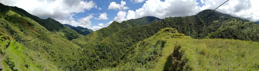 Obraz premium Rice Terraces of the Philippine Cordilleras, rice fields in Banaue region,Philippines ,Asia, rice production traditional agriculture,World Heritage Site consisting of a complex of rice terraces 