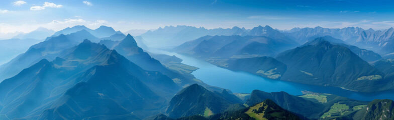 Panoramic aerial view of the lake surrounded by mountains