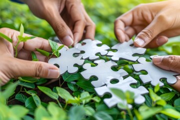 Fototapeta premium Hands fitting puzzle pieces together with greenery in the background natural and collaborative setting vibrant and inclusive atmosphere