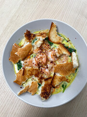 A bowl of prawn chowder soup.