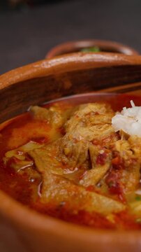 Vertical food video mole de panza menudo or mondongo close up