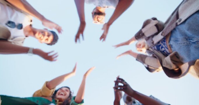 Friends, hand pile and teamwork outdoor for fun games together or competition, collaboration or blue sky. People, group and face below or hands clapping for sunshine adventure, winning or support