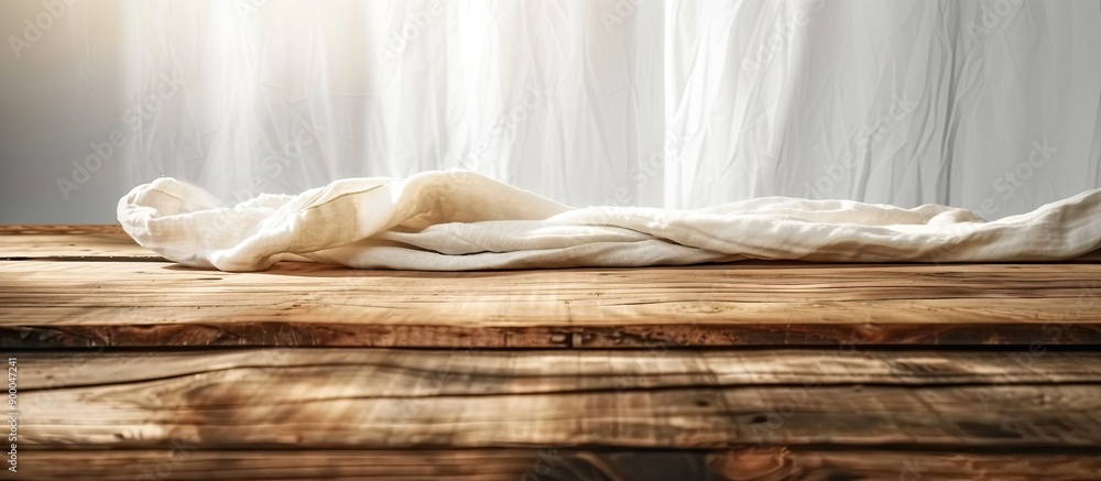 Aufkleber Wooden table covered with a tablecloth and space for additional image or text