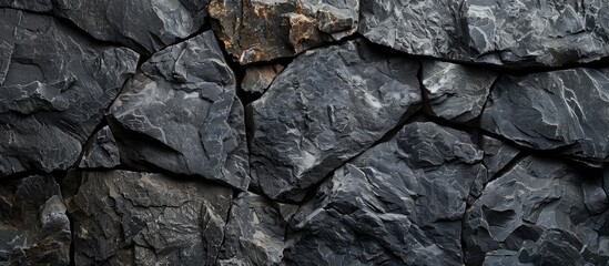 Stone textured banner in deep gray with room for text Black and rugged ideal for copy space image