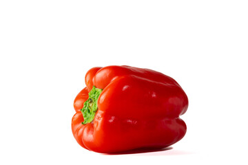 One whole bell pepper. Red, fresh, juicy, fleshy and crispy bell pepper. Close up on a white background