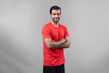 Full body length gaiety shot athletic and sporty young man in fitness exercise posture on isolated background. Healthy active and body care lifestyle.