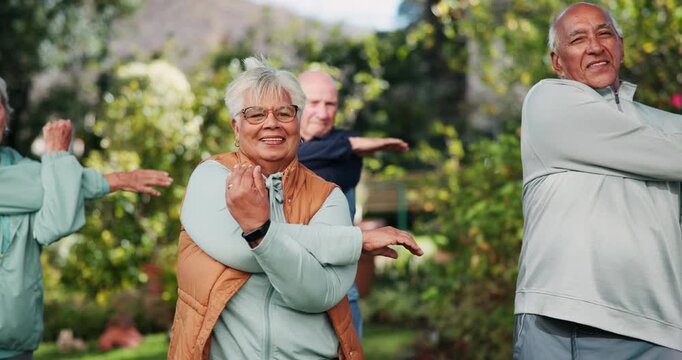 Nature, class and senior people stretching arms for fitness exercise in group at outdoor park. Health, active and elderly friends in retirement with warm up workout for wellness in field in morning.