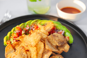 Entrada de botana acompañada de Salsa Pico de Gallo