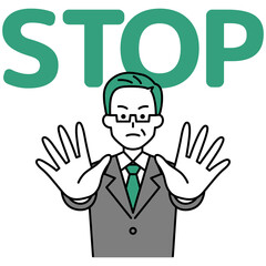 Fototapeta premium 両手を前に出してSTOPと言う中年のスーツの男性