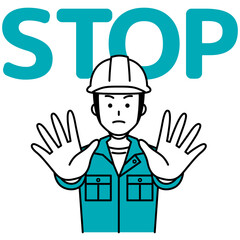 両手を前に出してSTOPと言う作業員の男性