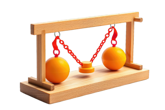 Wooden balance scale toy with orange balls and red chains, demonstrating physics and equilibrium concepts for educational purposes.