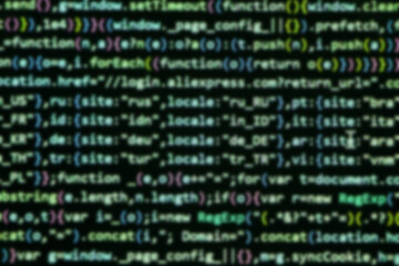 Blurry unfocused programming coding screen, web developer coding screen