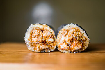 Chicken Shawarma wraps filled with mayonnaise served in bowl isolated on table background top view of bangladeshi, indian and pakistani food