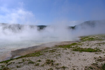 steaming thermal pool in Yellowstone National Park, USA