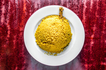 Chicken Khichuri Biryani rice served in bowl isolated on table background top view of bangladeshi, indian and pakistani food