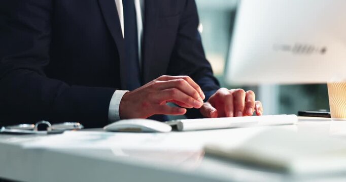 Businessman, hand and typing on computer in office for research, email and proposal or review with closeup. Technical writer, user manual and release notes for system documentation and software guide